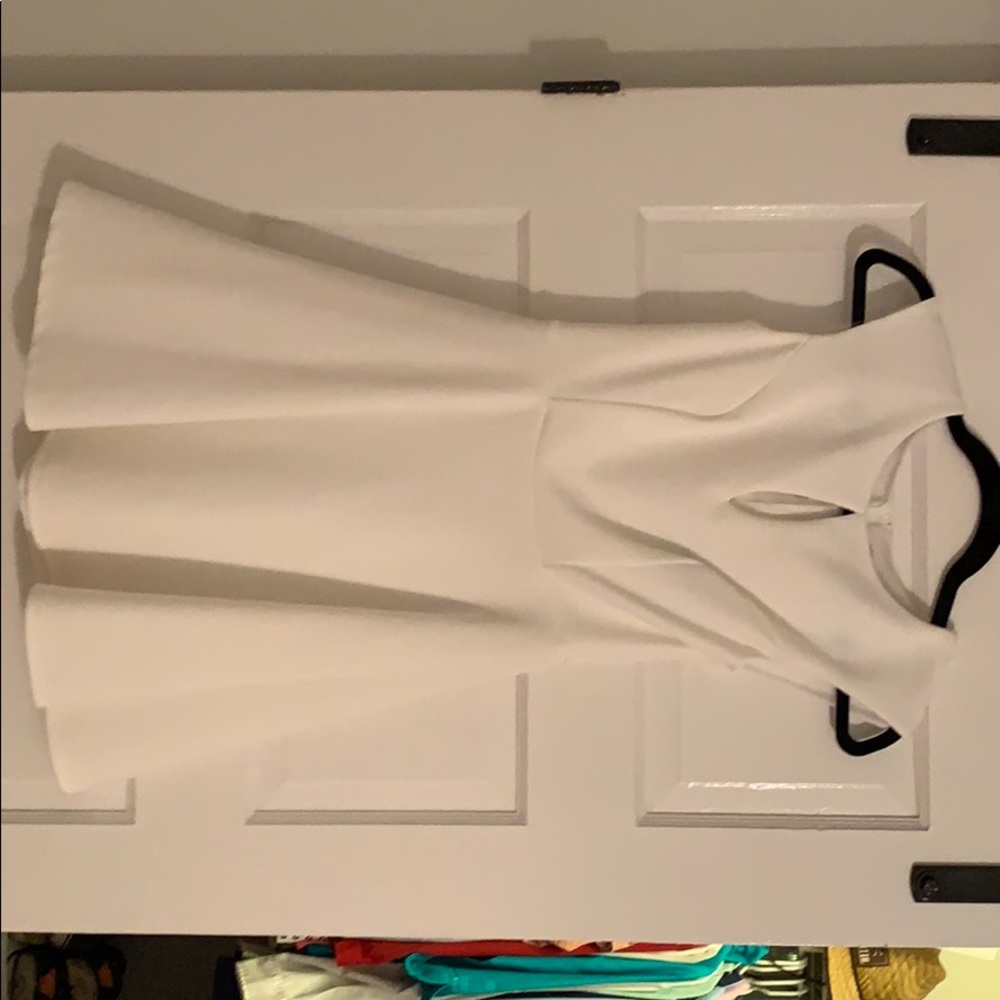 Short white dress with cut out detail on back